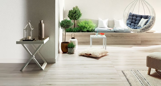 Modern living room with a sofa, coffee table, and decorative items.